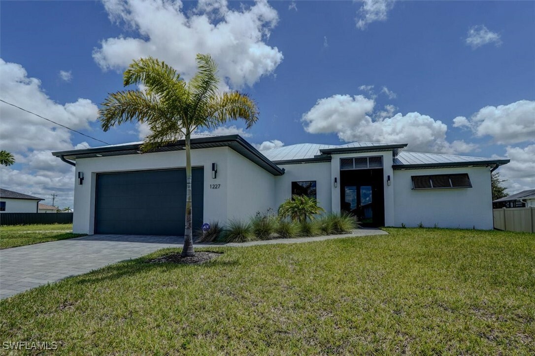 Property Photo: 1227 NW 40th Place FL 33993
