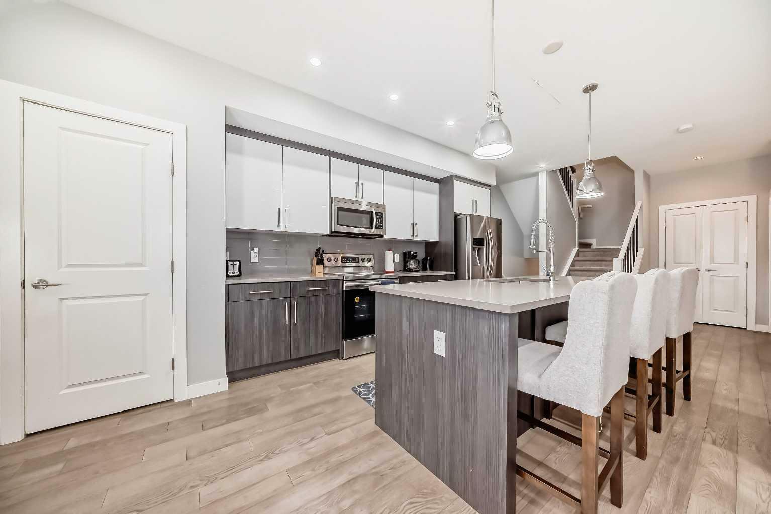 Property Photo:  1714 Kensington Road NW 1  AB T2N 3R3 