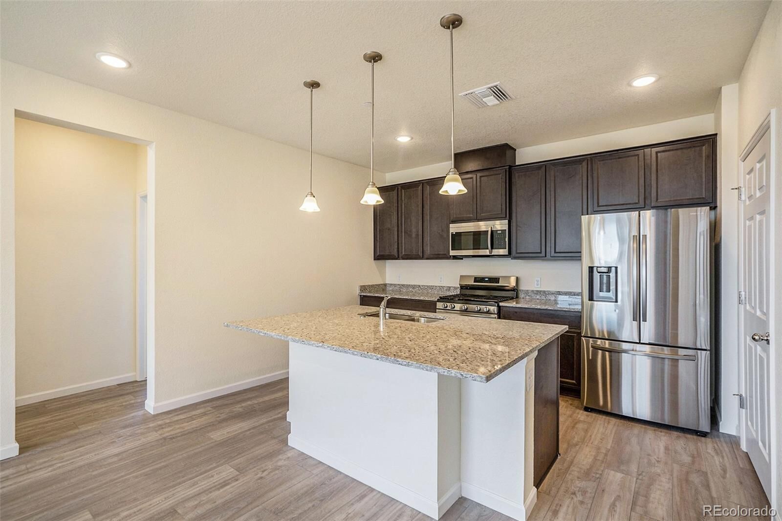 Property Photo: 6153 N Ceylon Street 201 CO 80249