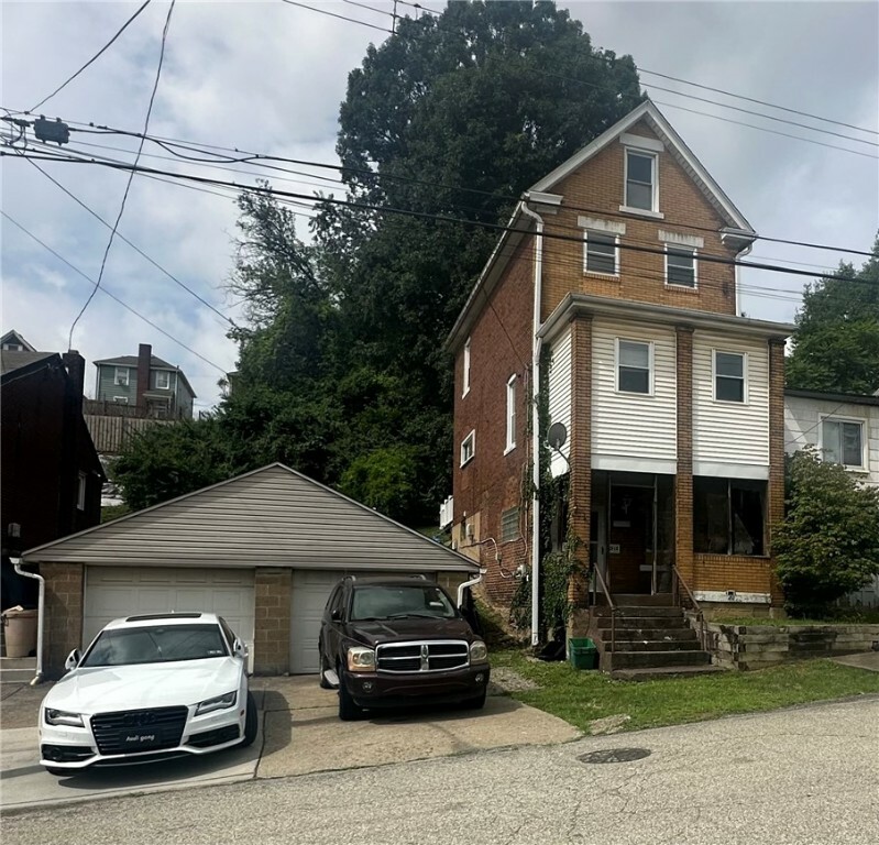 Property Photo:  1518 Wolfe Ave  PA 15104 