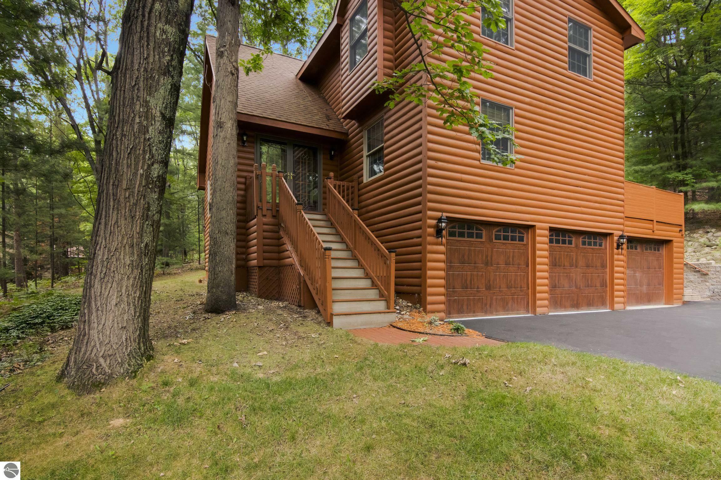 Property Photo:  3670 Holiday Village Road  MI 49686 