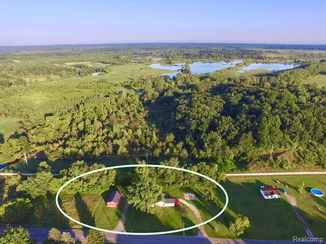 Property Photo:  6821 Coon Hill Road  MI 49259 