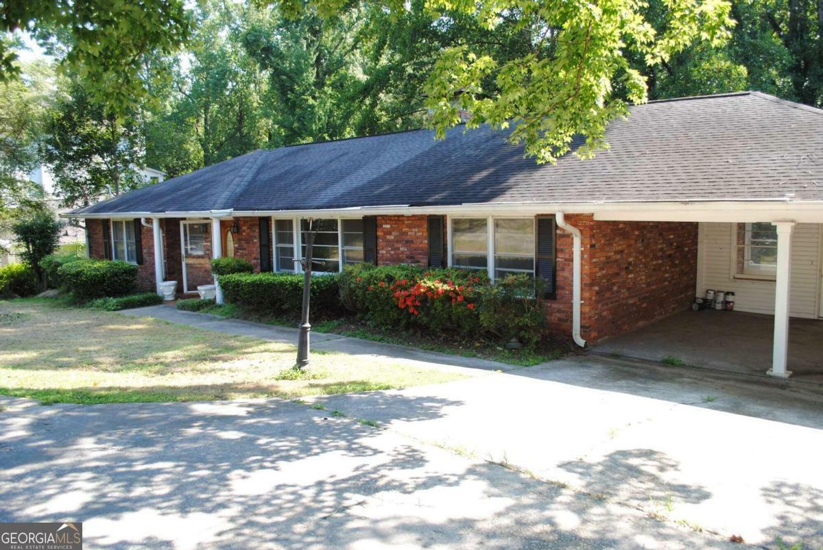 Property Photo:  4695 Lake Forrest Drive  GA 30342 