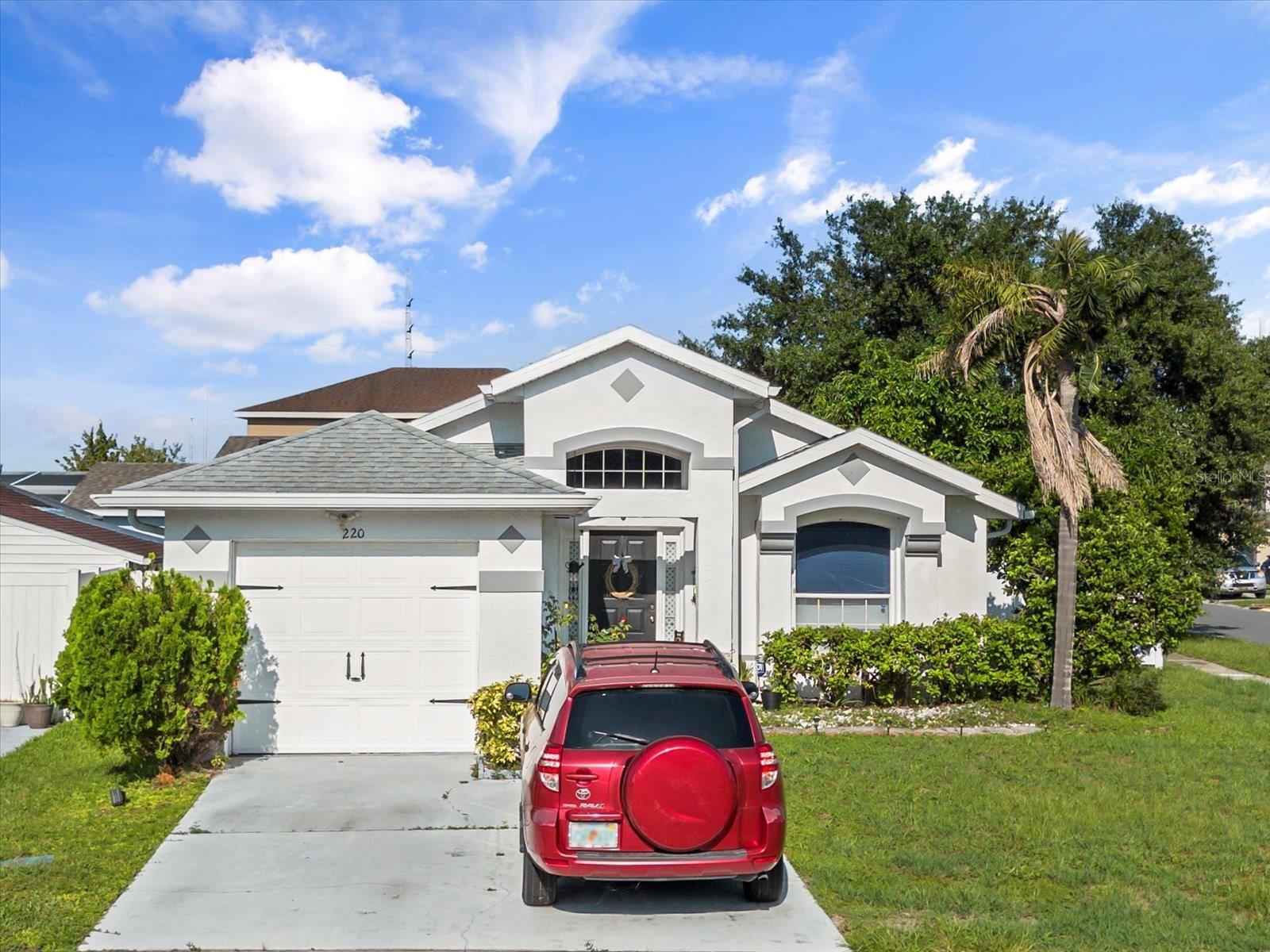 Property Photo: 220 Coralwood Court FL 34743