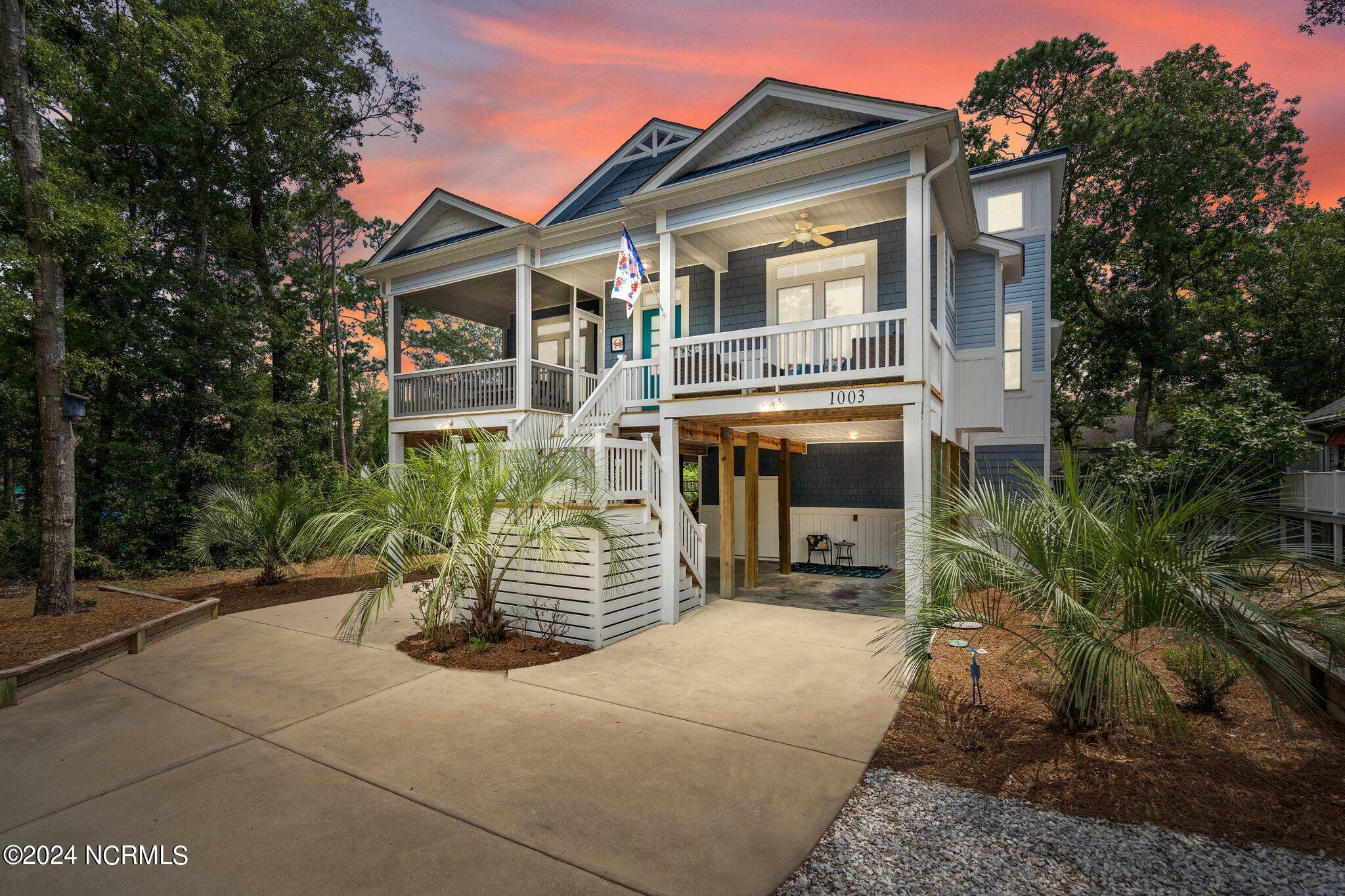 Property Photo:  1003 E Oak Island Drive  NC 28465 