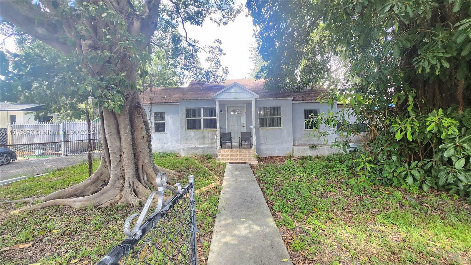 Property Photo:  1851 NW 90th St  FL 33147 