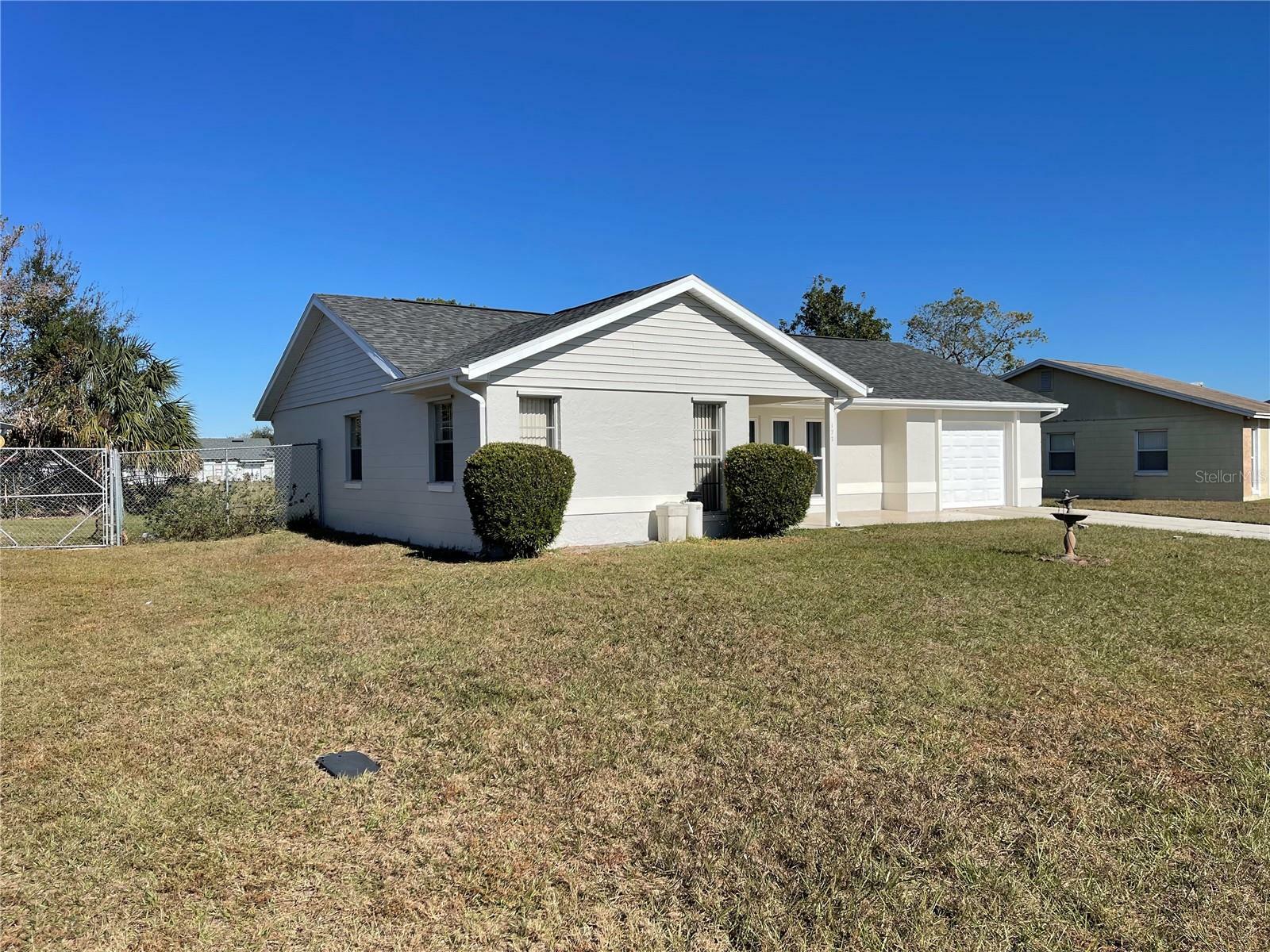 Property Photo:  177 E Cedarwood Circle  FL 34743 