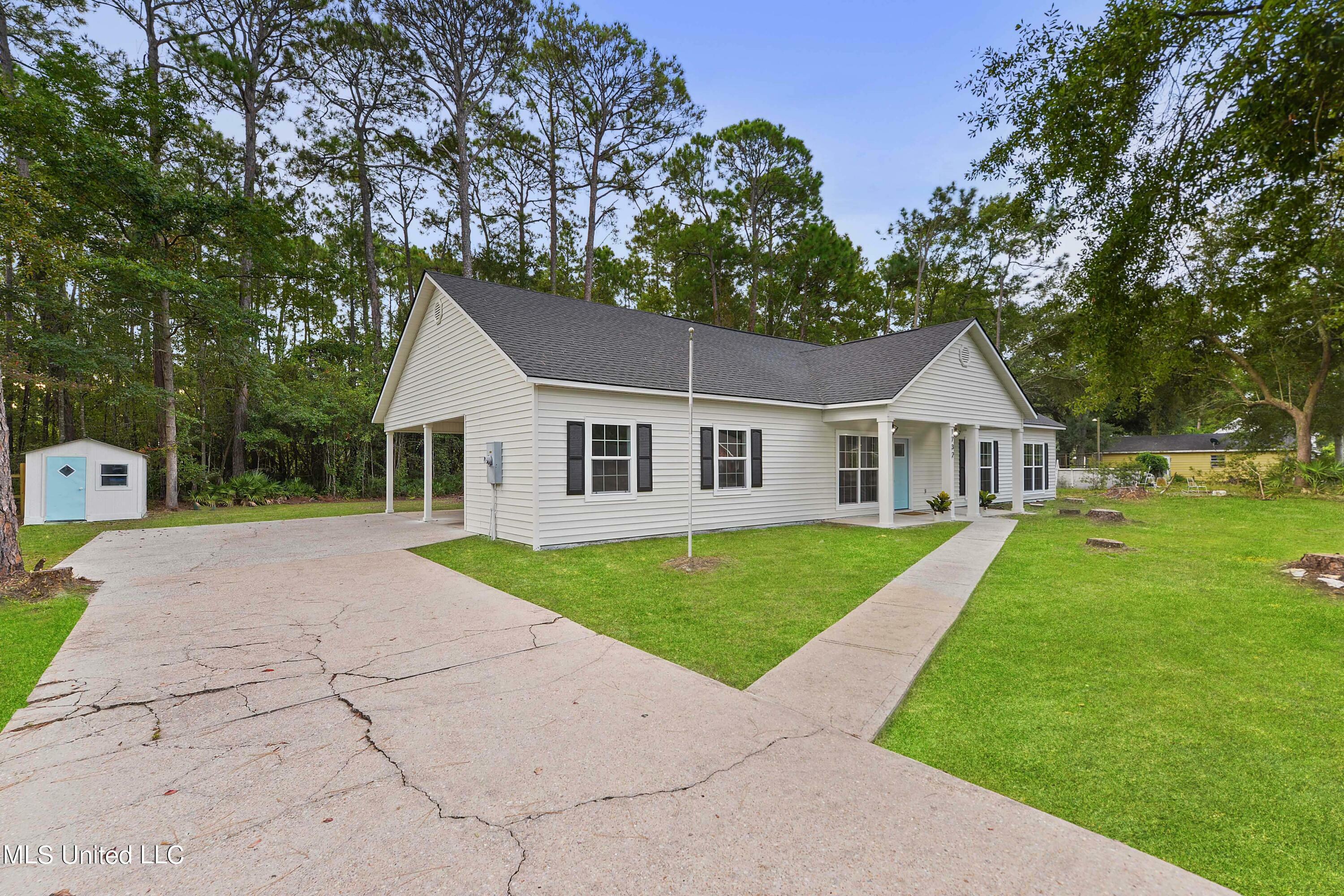 Property Photo:  1732 Dolphin Drive  MS 39553 