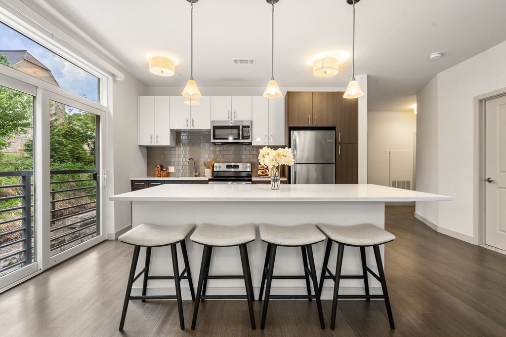 Property Photo:  99 Tremont At Oak Square 415  MA 02135 
