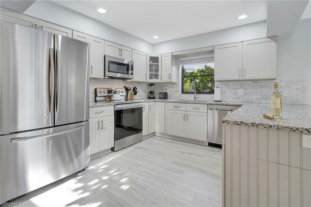 Property Photo: 758 103rd Ave N FL 34108