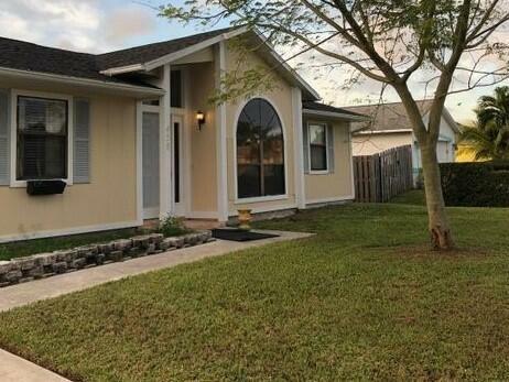 458 SE Cork Road  Port Saint Lucie FL 34984 photo