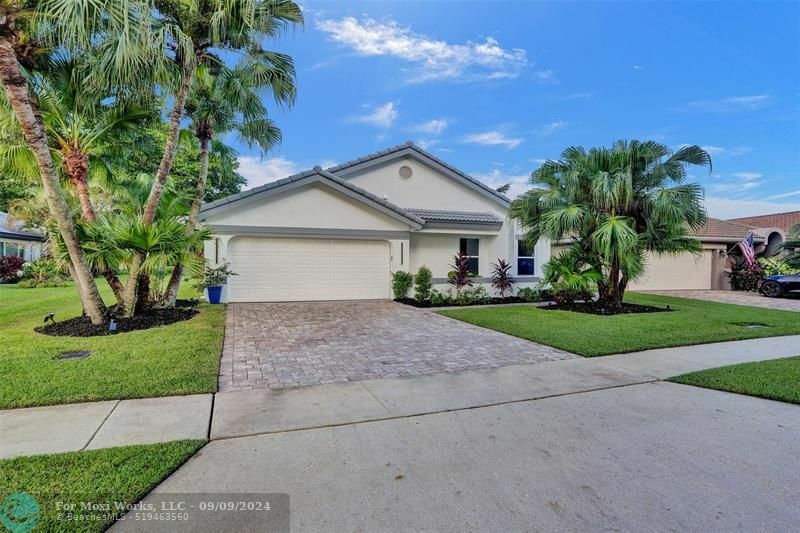 Property Photo:  11180 Clover Leaf Cir  FL 33428 