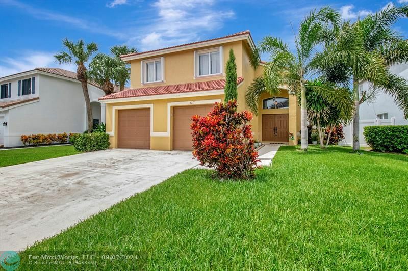 Property Photo:  5217 Prairie Dunes Village Cir  FL 33463 