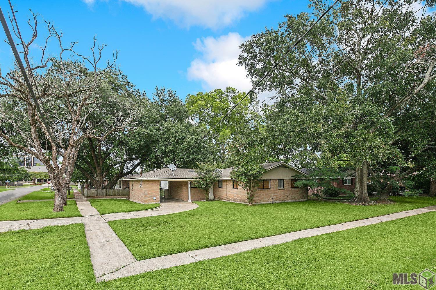 Property Photo: 8435 S Essen Heights Ct LA 70809