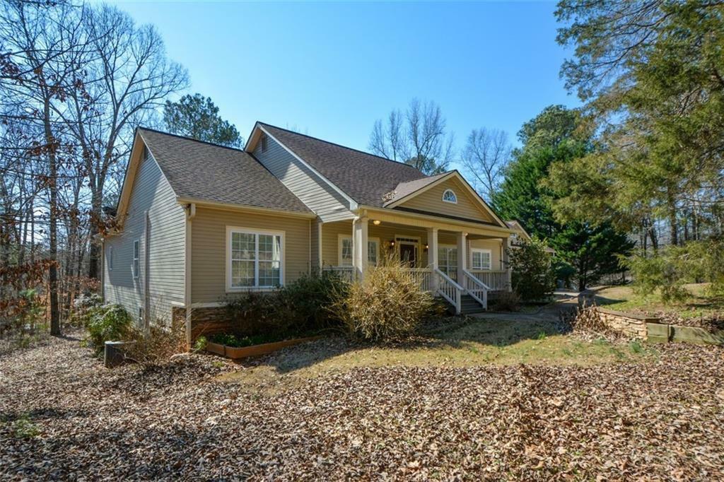 Property Photo:  6865 Cowan Mill Road  GA 30187 