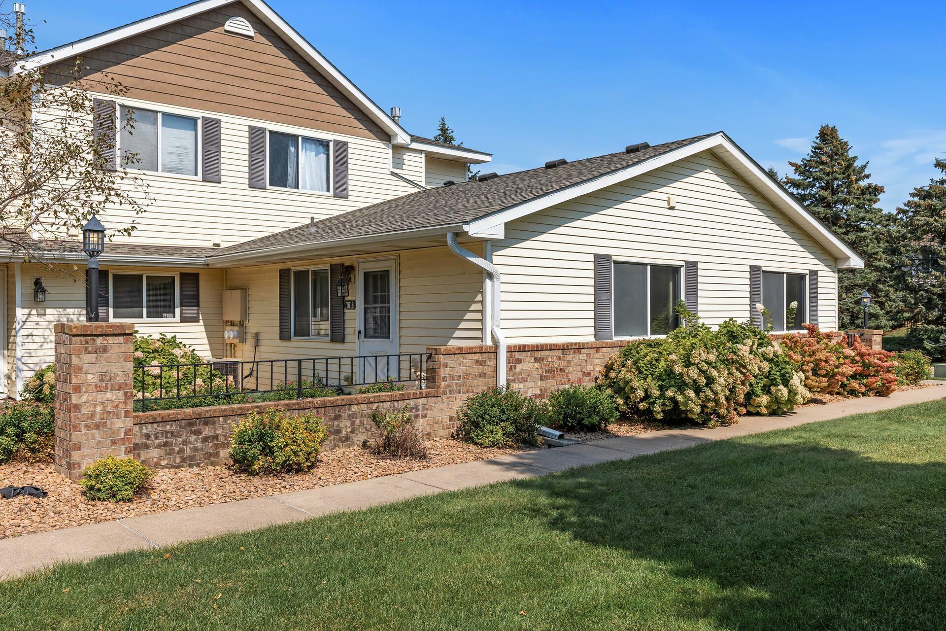 Property Photo: 7616 13th Street N MN 55128