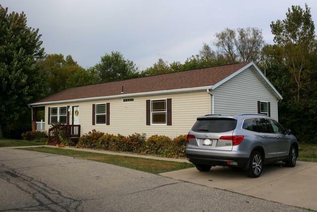 Property Photo:  897 East Lake Street 93  WI 53551 