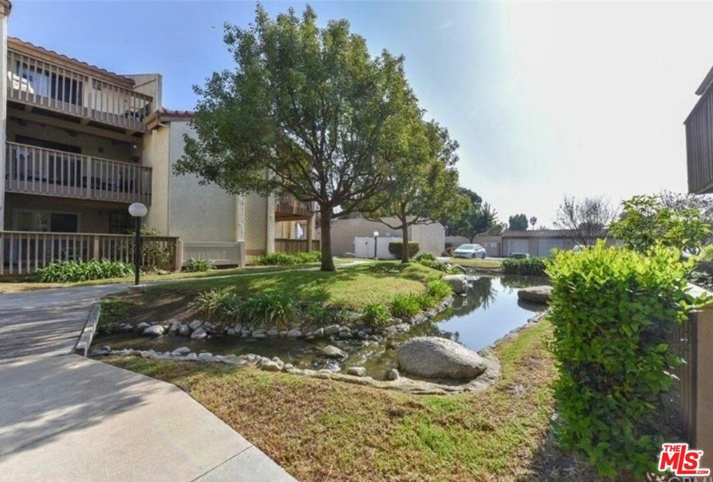 Property Photo:  4791 Lago Drive 103  CA 92649 