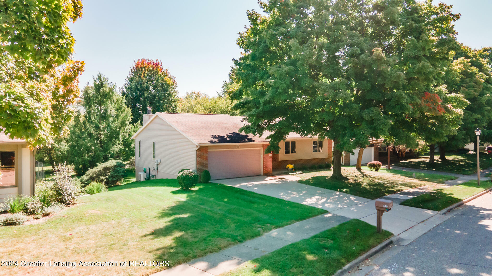 Property Photo:  3938 Jonquil Lane  MI 48864 