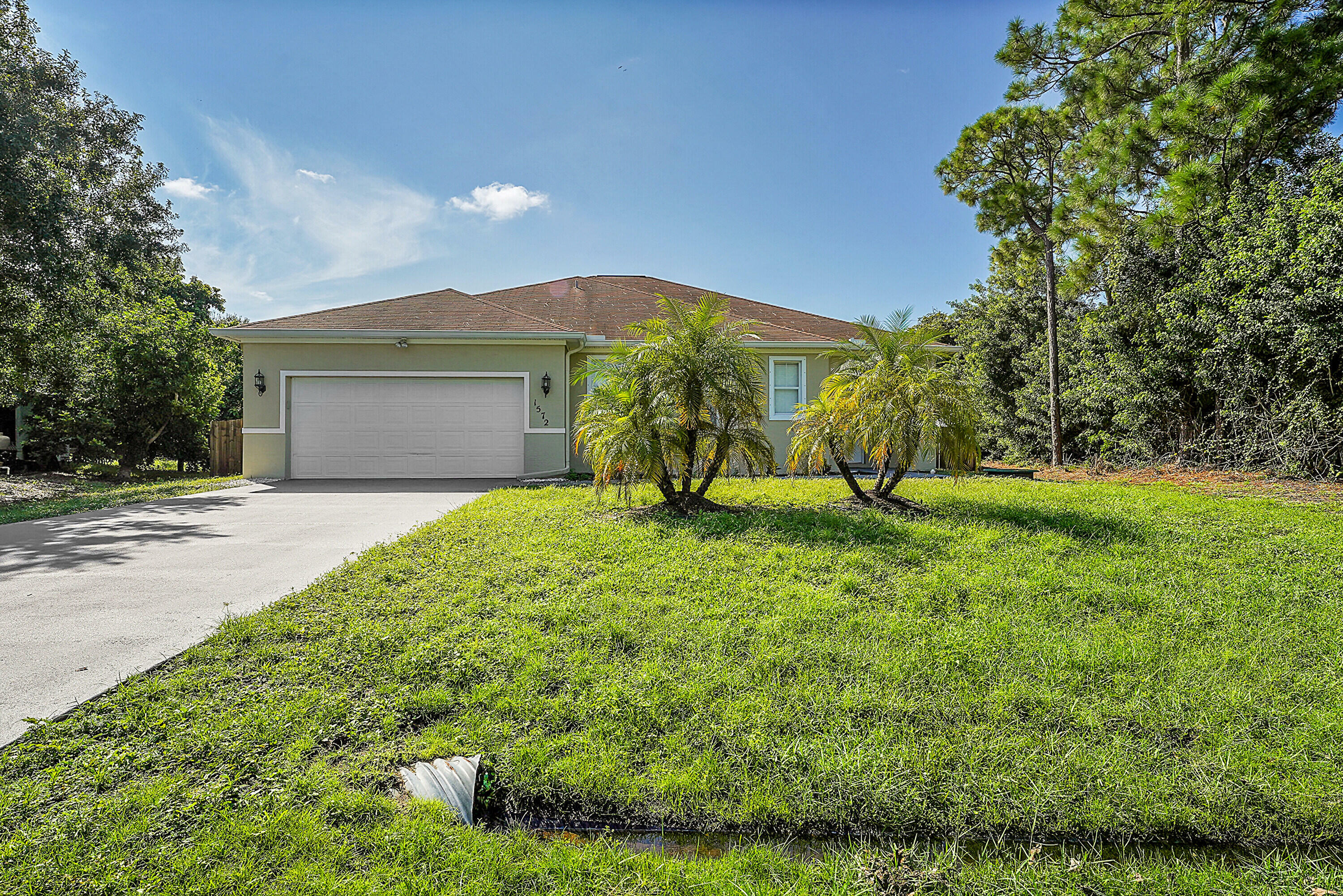 Property Photo:  1572 SW Gager Road  FL 34953 