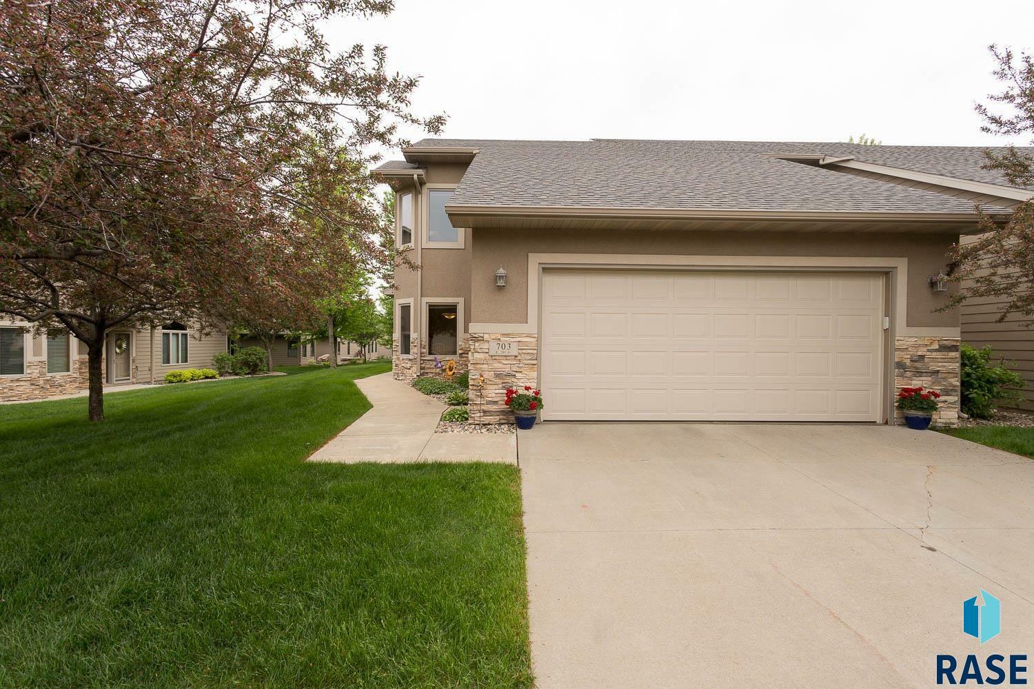 Property Photo:  703 E 70th Pl  SD 57108 