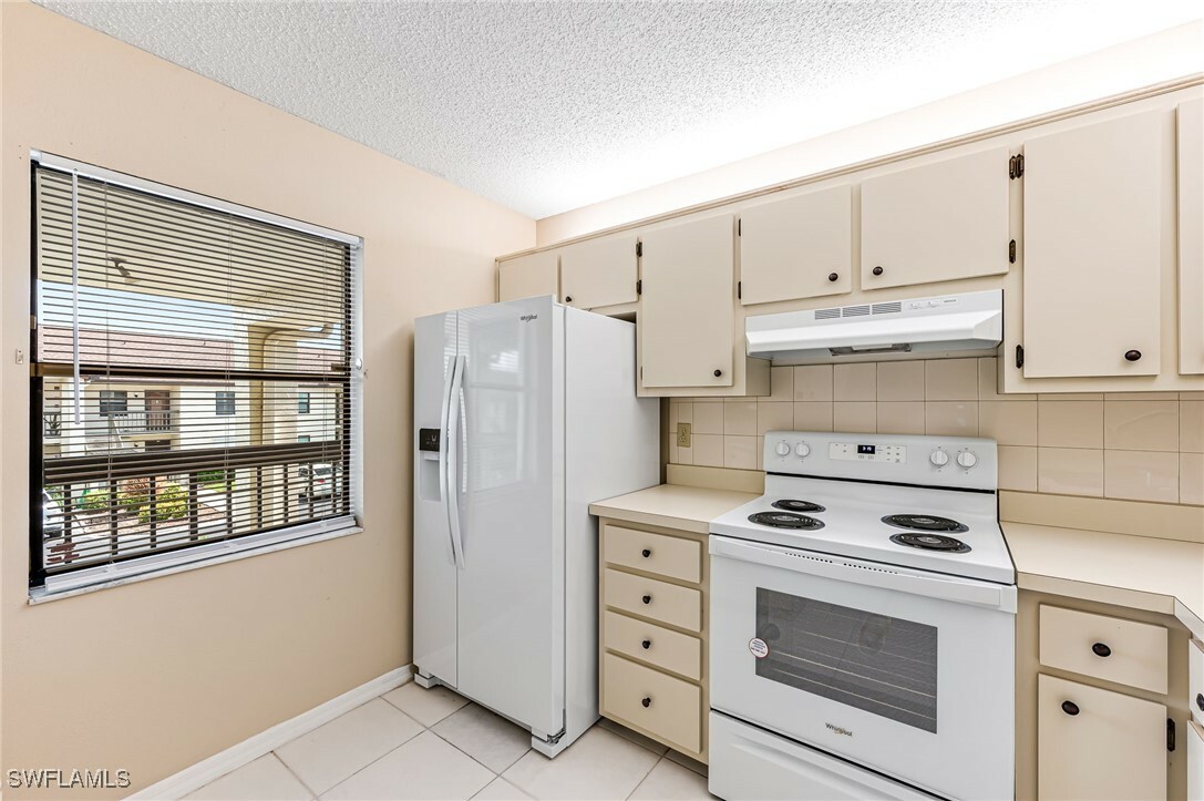 Property Photo:  9275 Lake Park Drive 204  FL 33919 