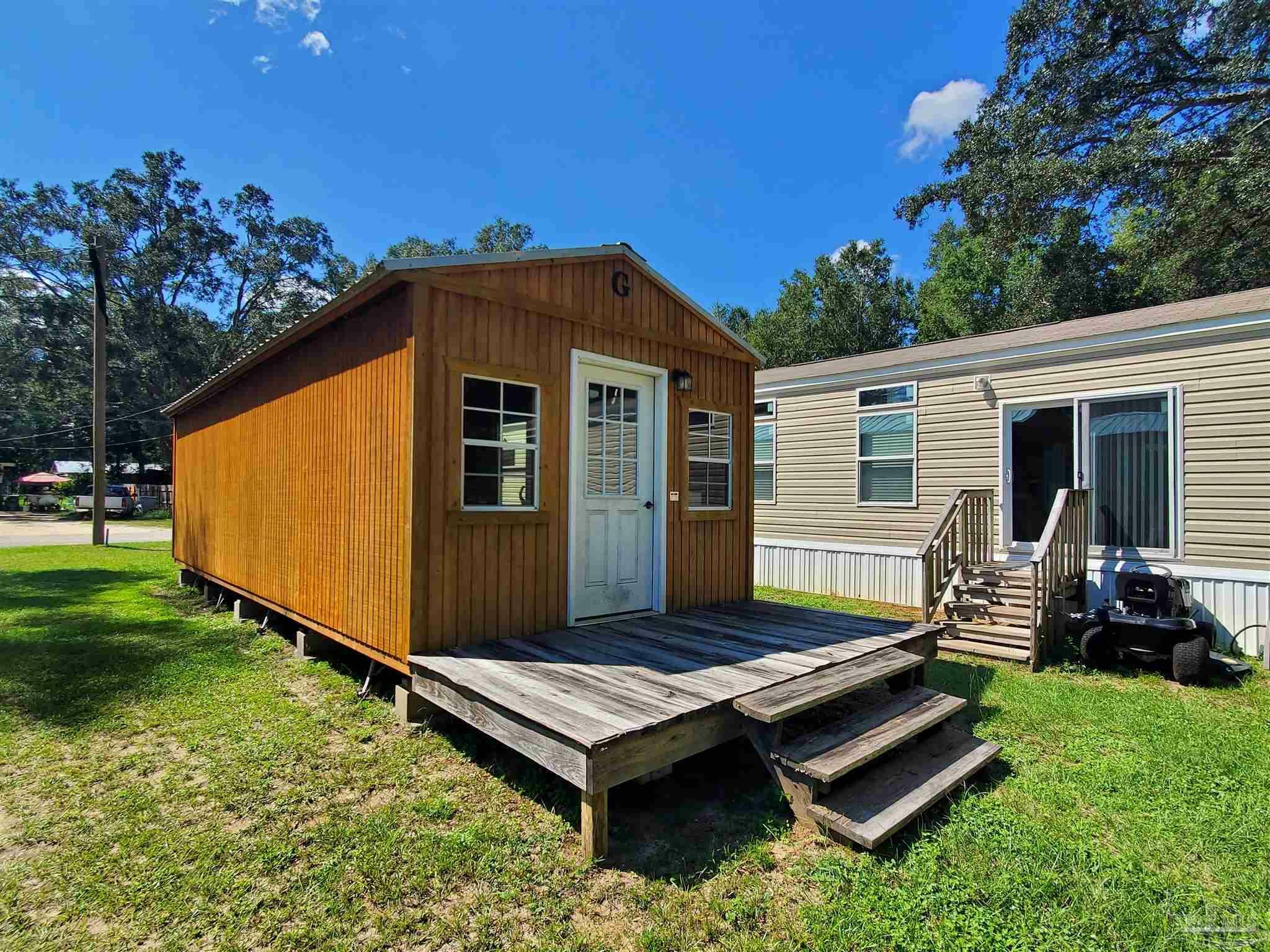 Property Photo:  6438 Robie Rd  FL 32570 