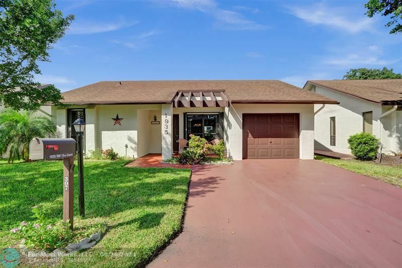 Property Photo:  1935 SW 15th Ct  FL 33442 