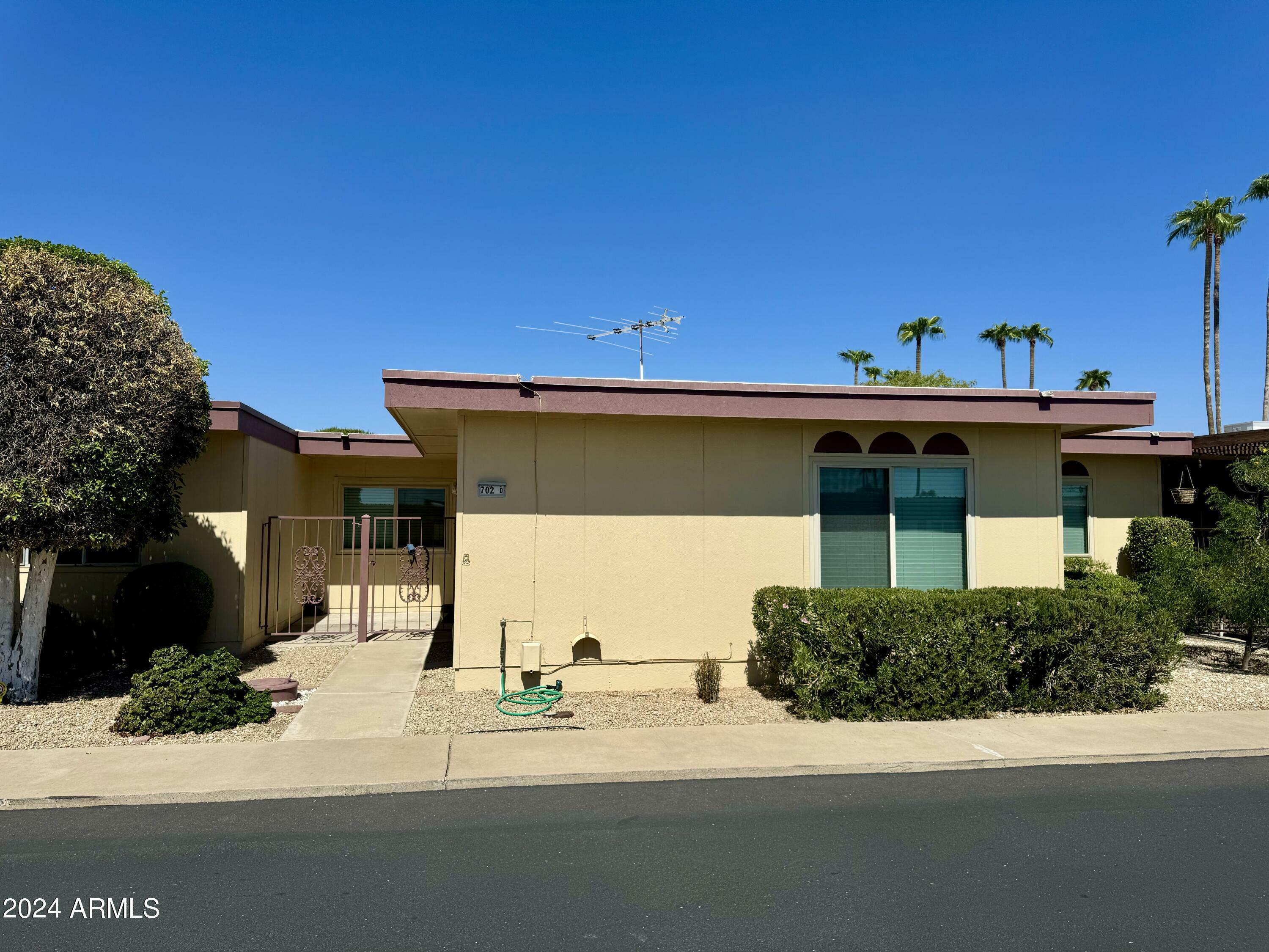 Property Photo:  13702 N 98th Avenue D  AZ 85351 