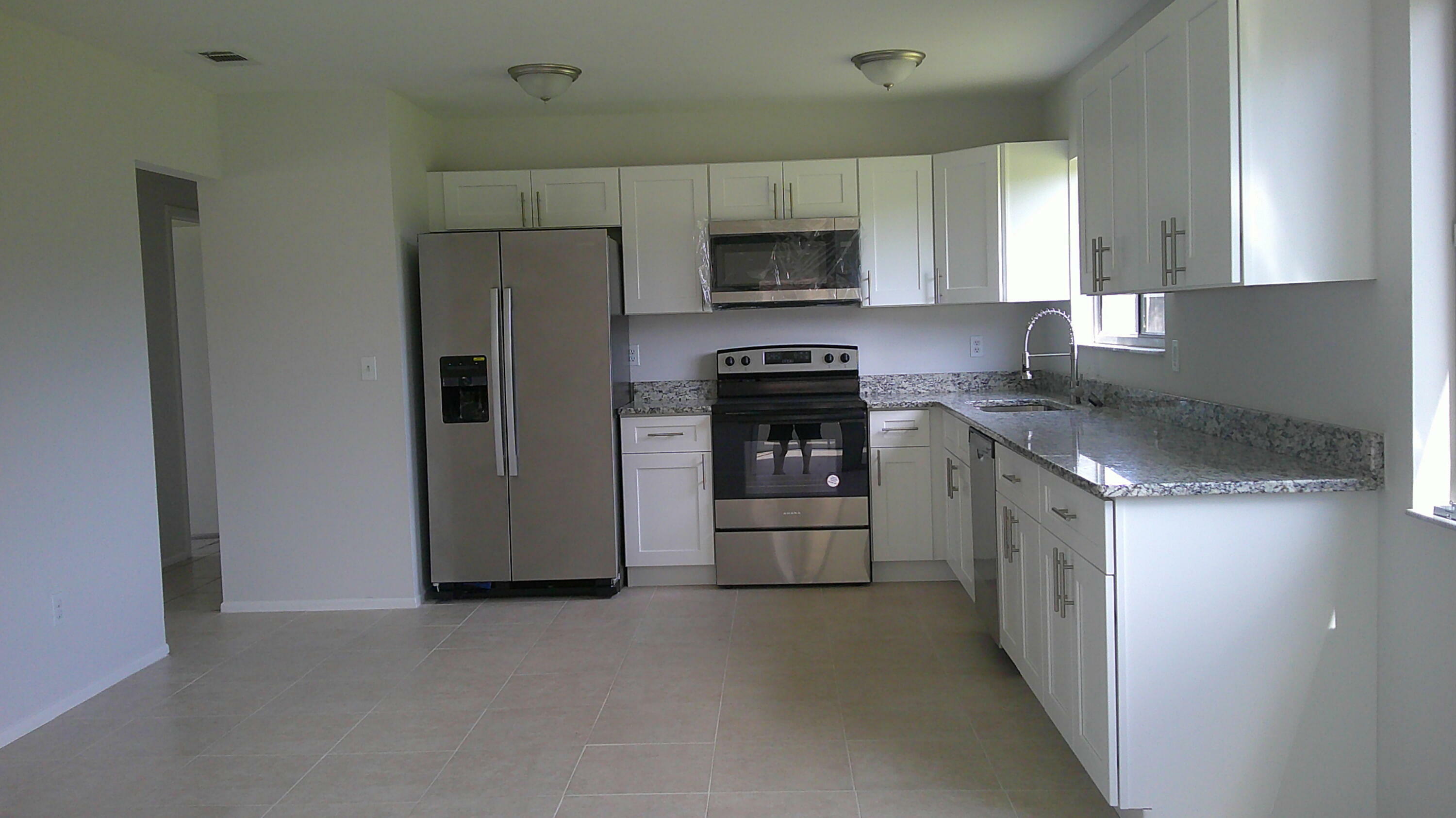 Property Photo:  2365 SE Aneci Street  FL 34984 