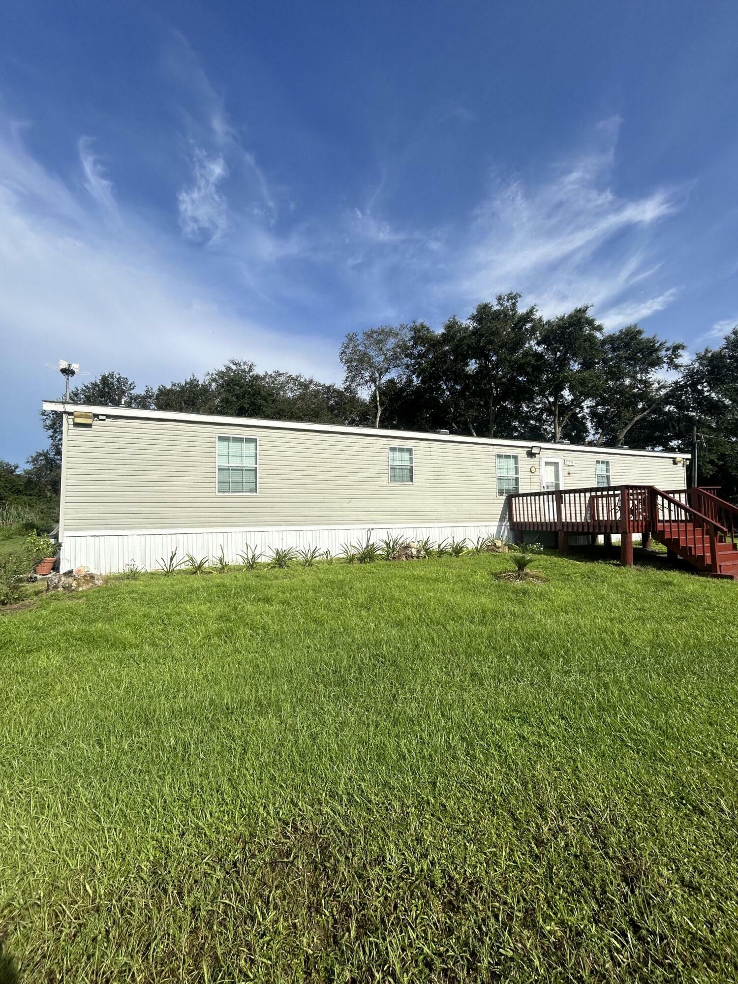 Property Photo:  775 N Coral Street  FL 33440 