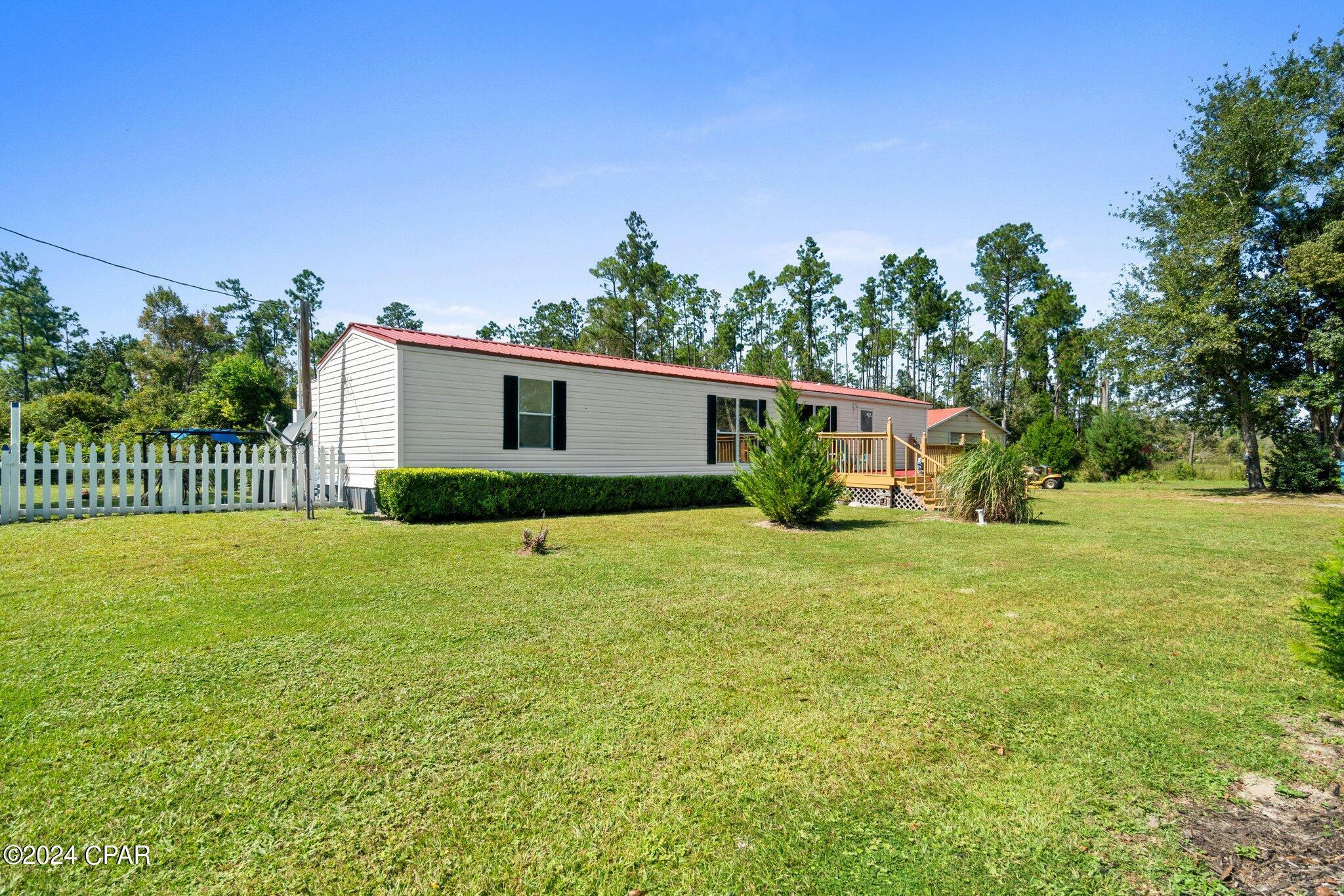 Property Photo:  17233 Highway 231  FL 32438 