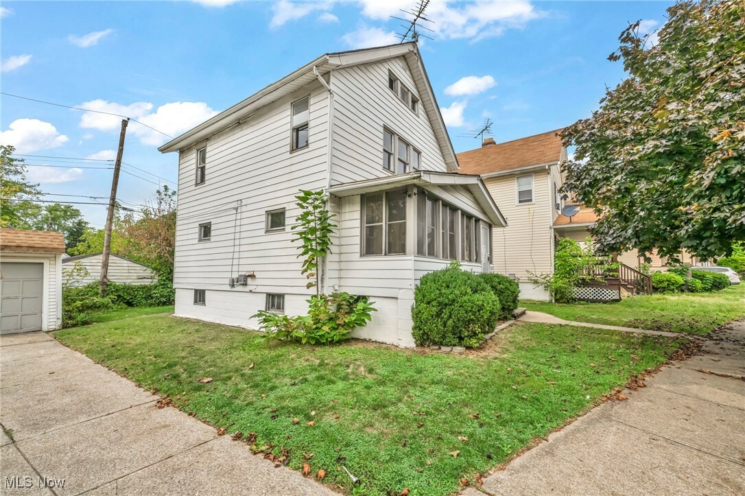 Property Photo:  8801 Macomb Avenue  OH 44105 