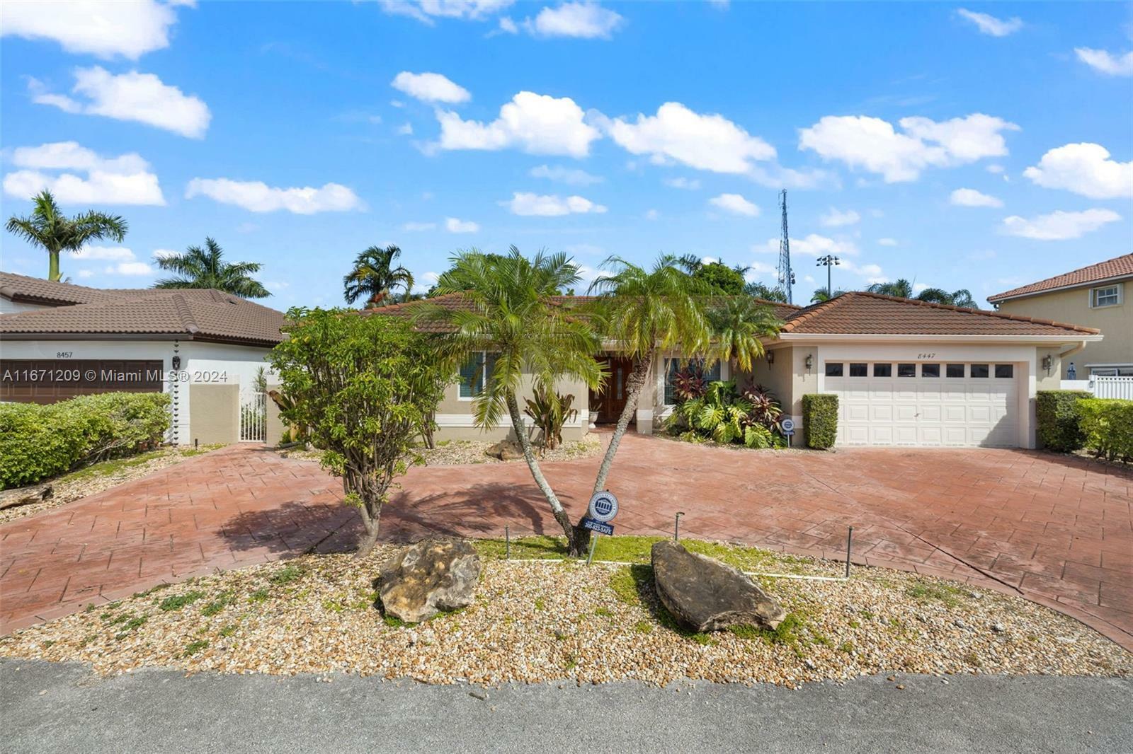 Property Photo:  8447 NW 201st Ter  FL 33015 