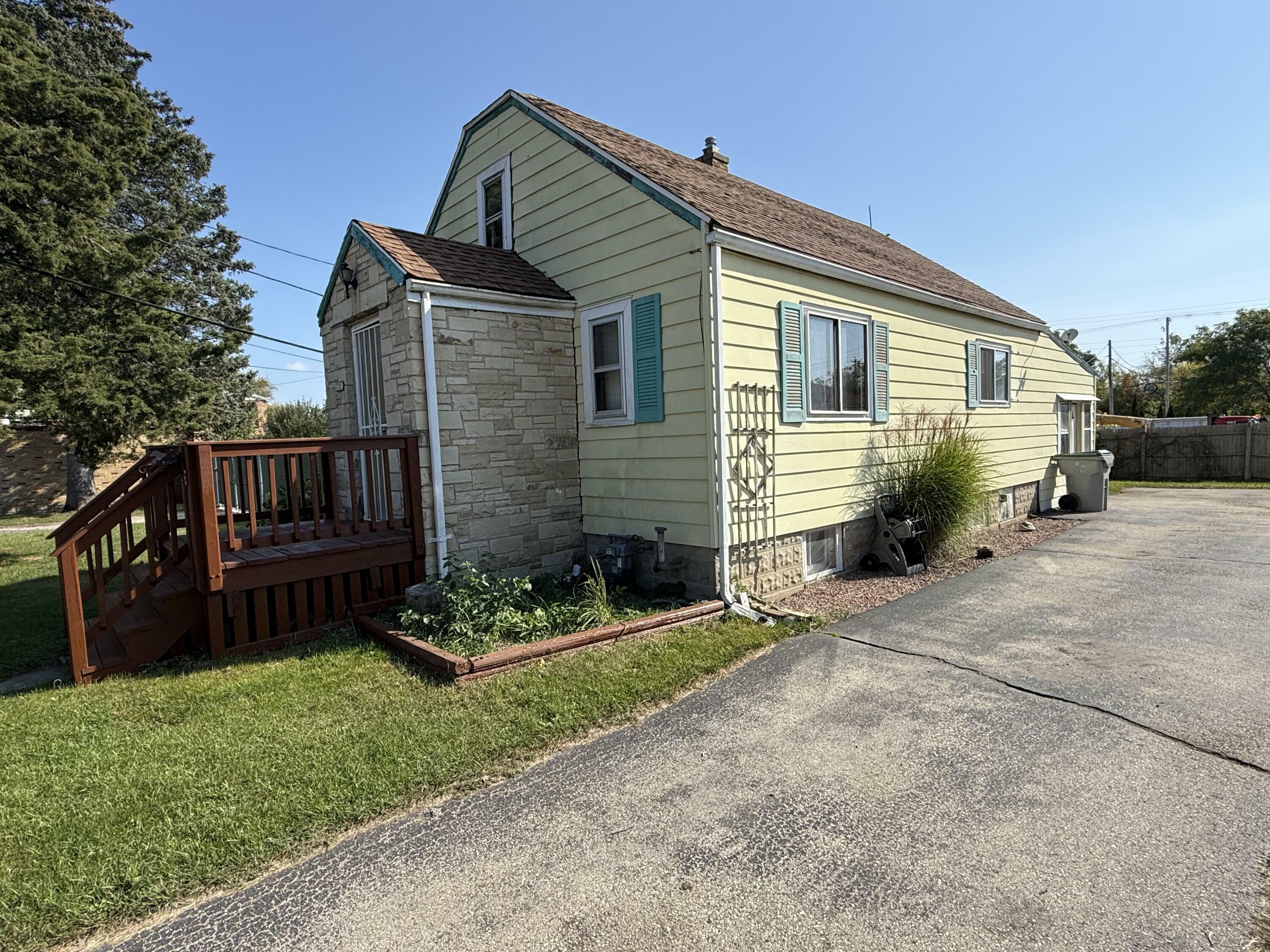 Property Photo:  5201 W Mill Rd  WI 53218 