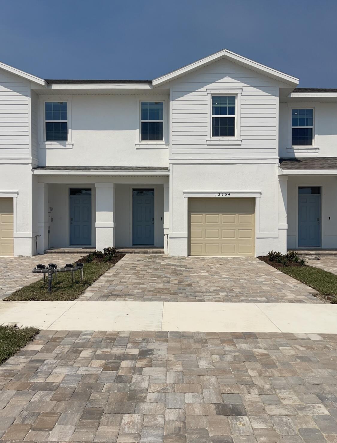 Property Photo: 12865 SW Forli Way FL 34987