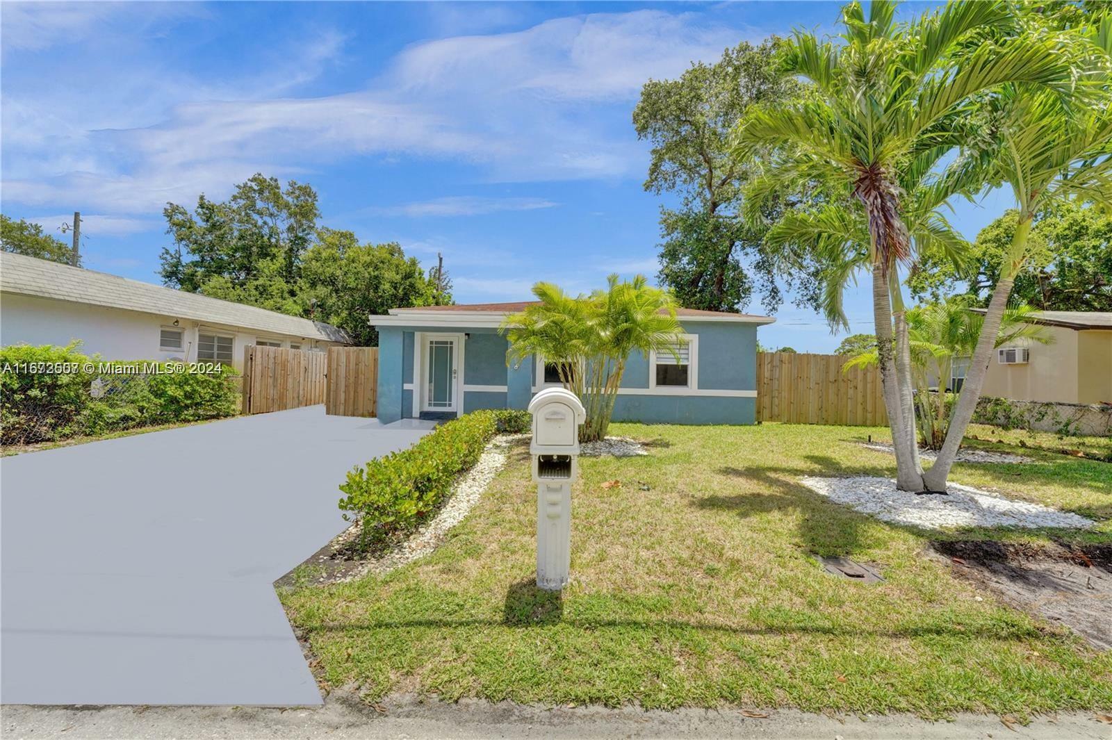 Property Photo:  878 NW 17th Ave (Front)  FL 33311 