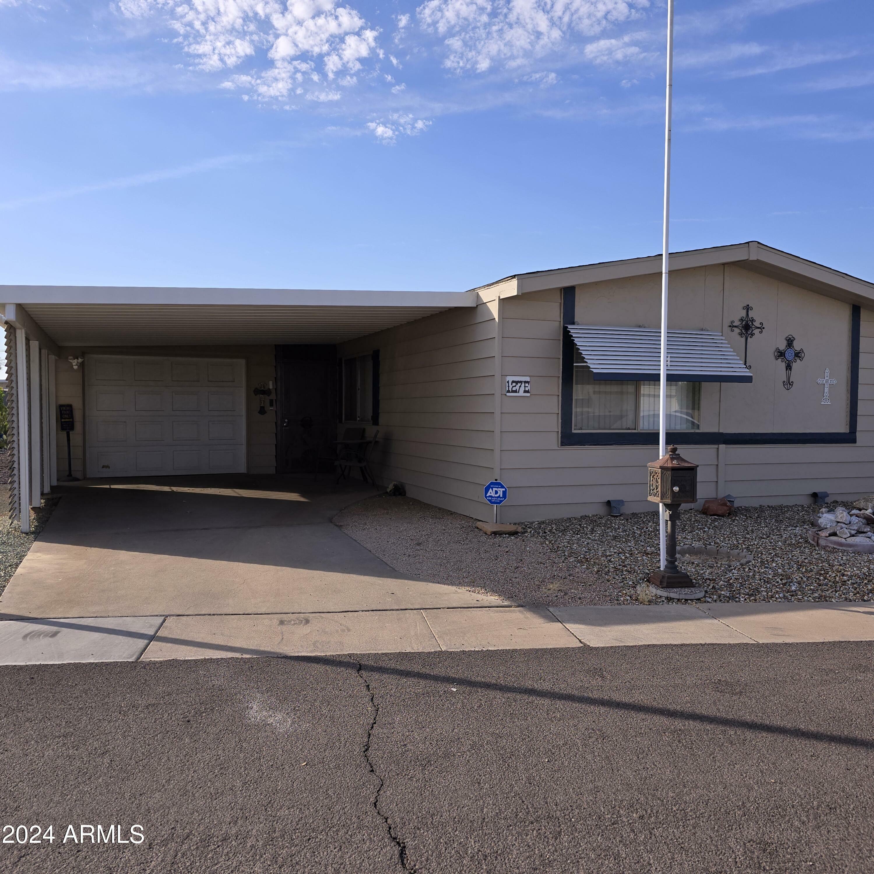 Property Photo:  10201 N 99th Avenue 127  AZ 85345 