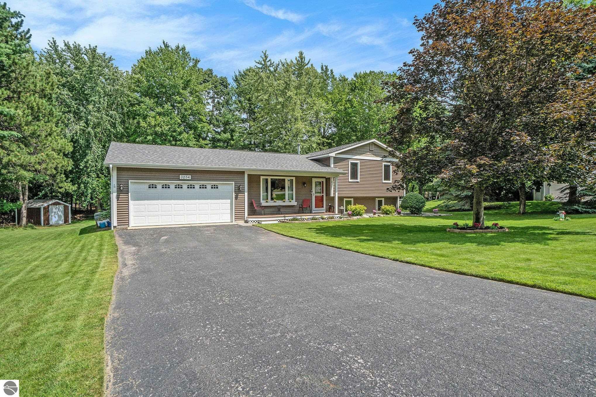 Property Photo:  3234 English Woods Drive  MI 49686 