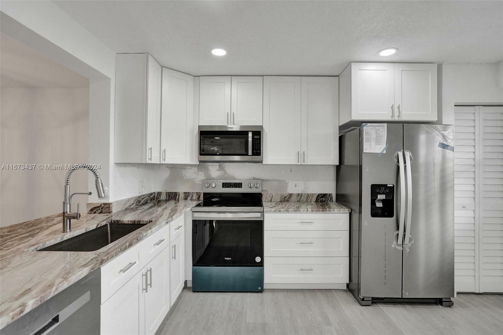 Property Photo:  12650 SW 6th St 407K  FL 33027 