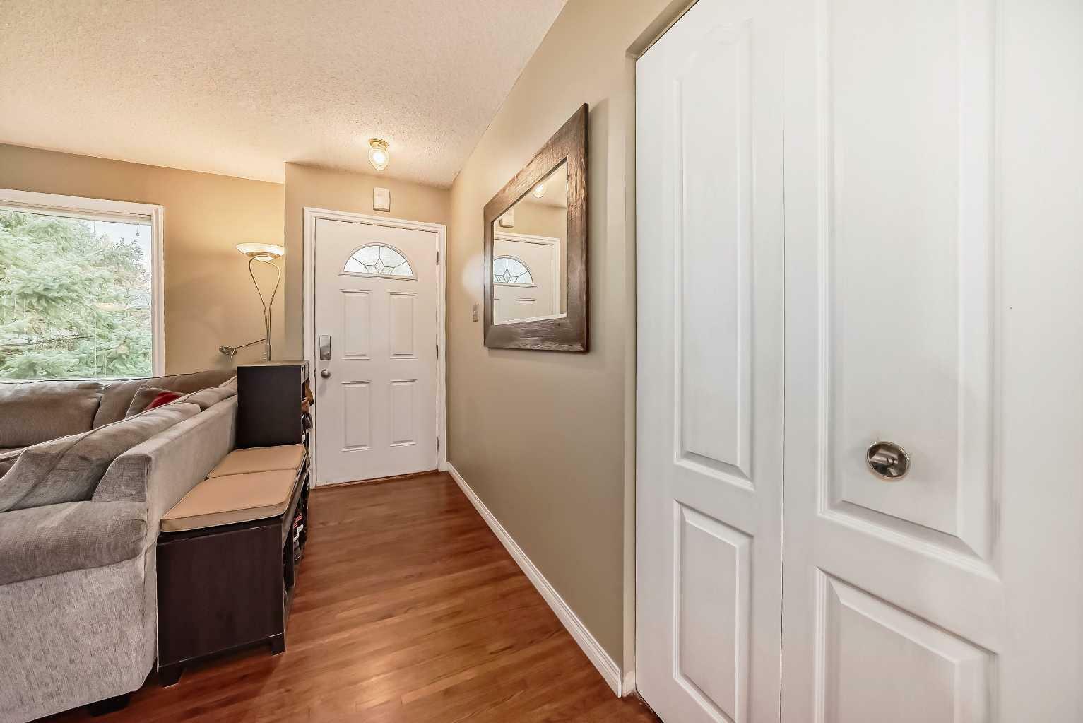 Property Photo:  46 Windermere Road SW  AB T3C 3K3 