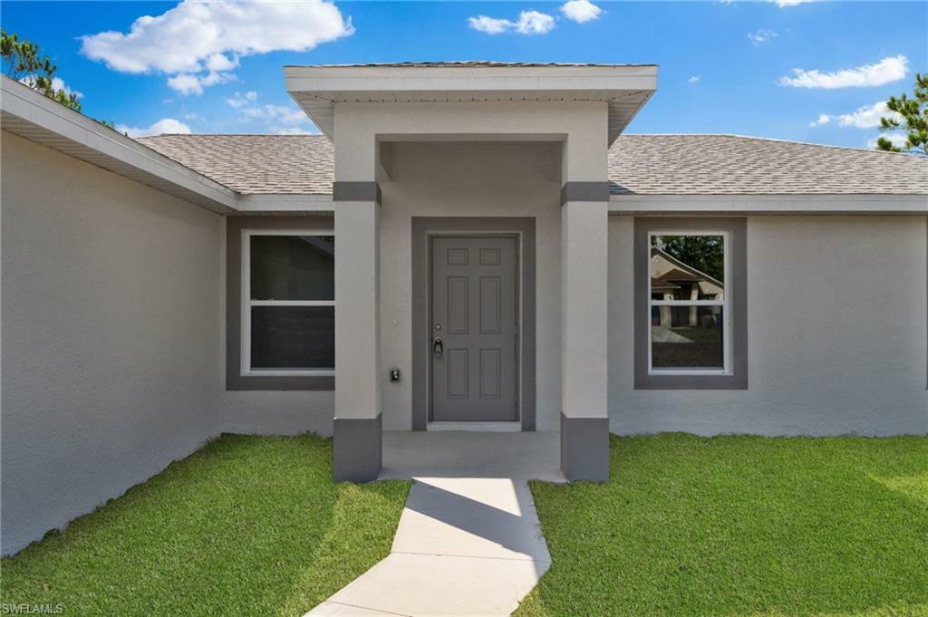 Property Photo:  237 Narcissus Ave S  FL 33974 