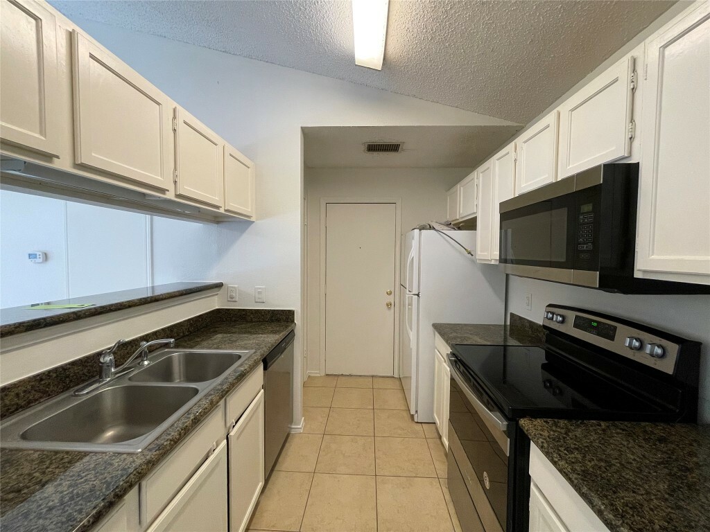 Property Photo:  208 B Sailmaster Street B  TX 78734 