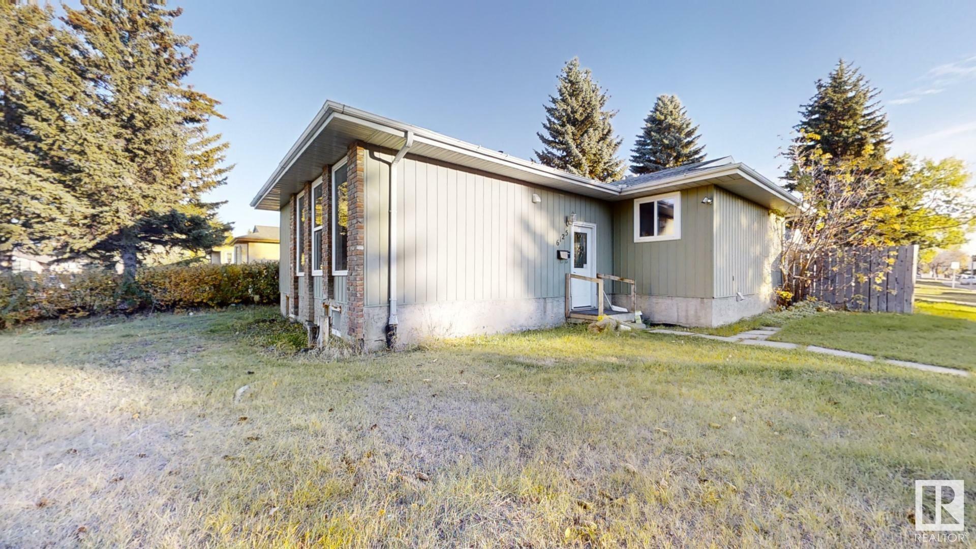 Property Photo:  6125 17A Ave NW  AB T6L 2B8 