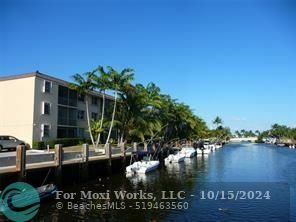 Property Photo:  4500 N Federal Hwy 328D  FL 33064 