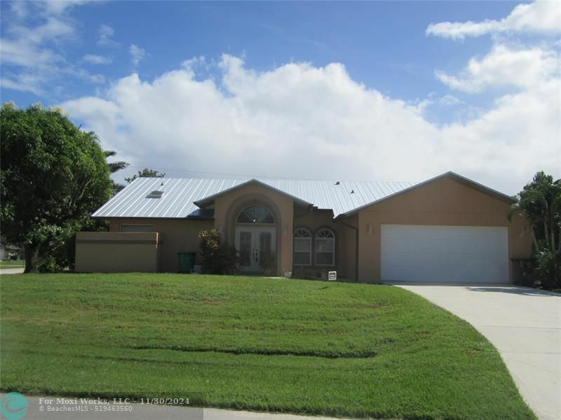 Property Photo:  6958 NW Hartney Way  FL 34983 