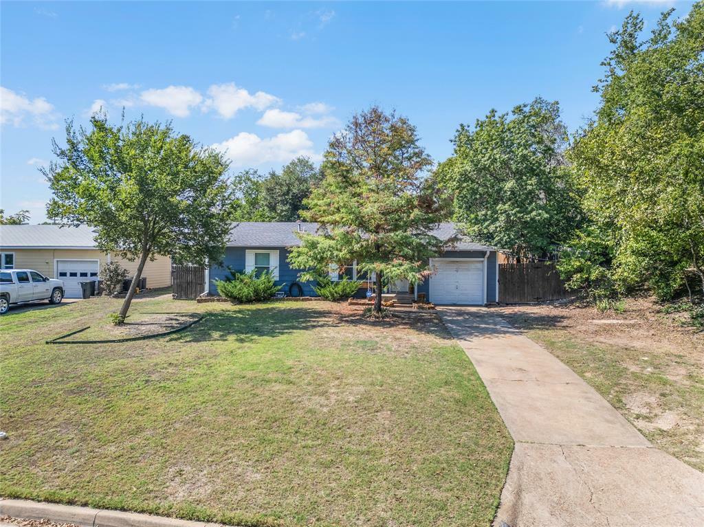 Property Photo:  115 Harmon Street  TX 76086 