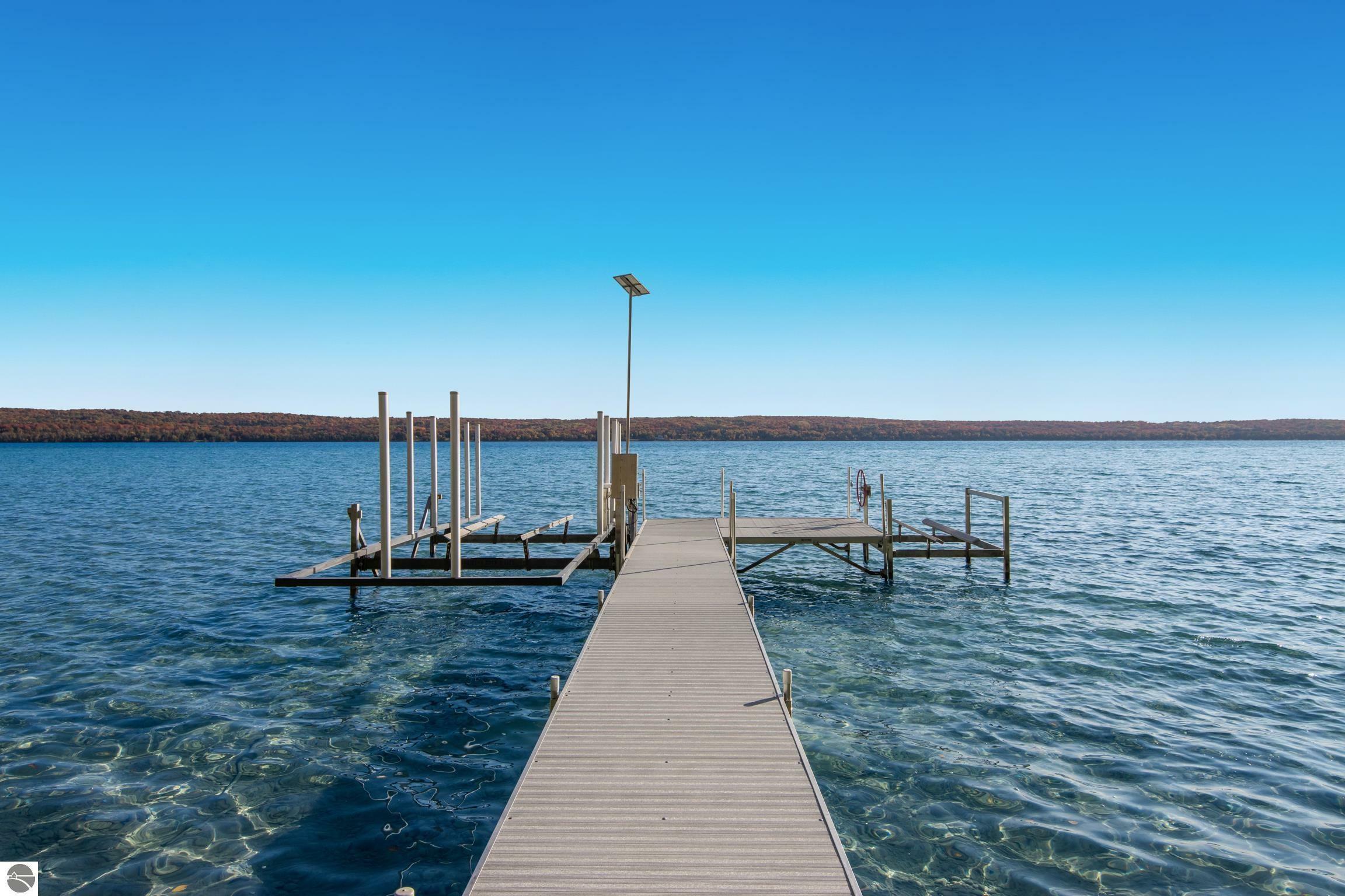 Property Photo:  205 NW Torch Lake Drive  MI 49648-9251 