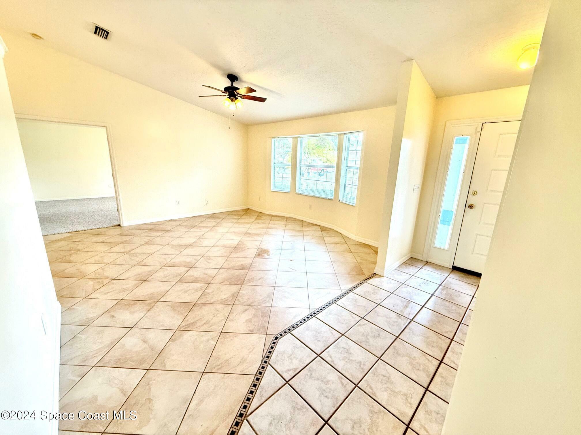 Property Photo:  7070 Ackerman Avenue  FL 32927 