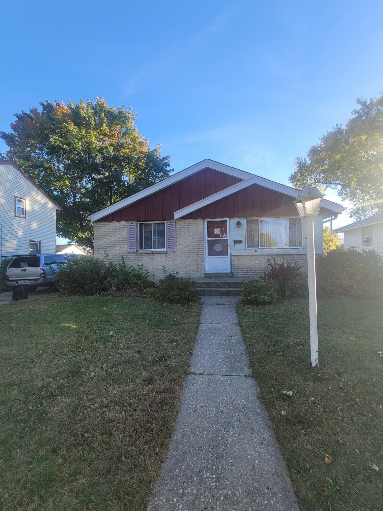 Property Photo:  6127 W Boehlke Ave  WI 53223 